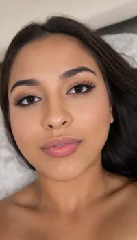 brown skinned Indian woman looking at viewer, (extremely hooked nose), curved nose, plucked eyebrows, dark skinned brown lips, dimples