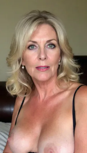 beautiful gorgeous stunning sexy 50yo mom, blonde hair, fine facial features, long flowing messy, chubby face, (gilf:1.3), (granny:1.2), sagging bare breasts, wide areolae, puffy, nipples, dark, ghost, wide, <lora:Nipples XL:.5>