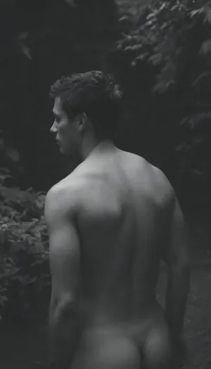 ((very dark and black background)), (((black background))), ((greyscale)), ((underexposed photo)), a nude man, short dark hair, ((white t-shirt)), in a garden, full body, nude, youth, ((back)), GapingAssholesAllFourQuiron, spied, spread, ass, <lora:SpreadAssSDXL_v04:.5>