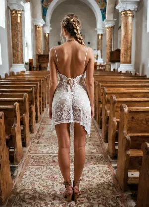 The young woman in the church was dressed in a full-body white tunic with a narrow waist and laced gladiator sandals. She had an intense look on her face as she prayed, her eyes closed and her hands clasped together