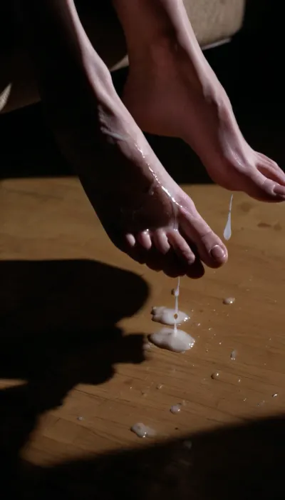 extreme close-up on a foot with excessive cum on it, ((excessive thick cum:1.3)), 8k, photorealistic, soft lighting, cinematic dark lighting, an interplay of light and shadow, artsy, work of art, price winning, <lora:dark:.8>