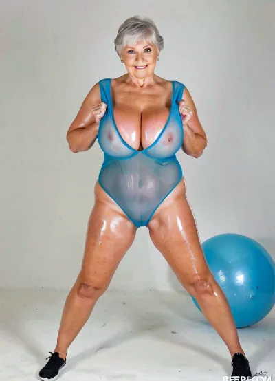 Very busty common granny with oversized giant breasts, perfect oiled body, seethrough leotard, real grandmother style, aerobics poses, exercices High quality photo, high detailed photo, photo studio